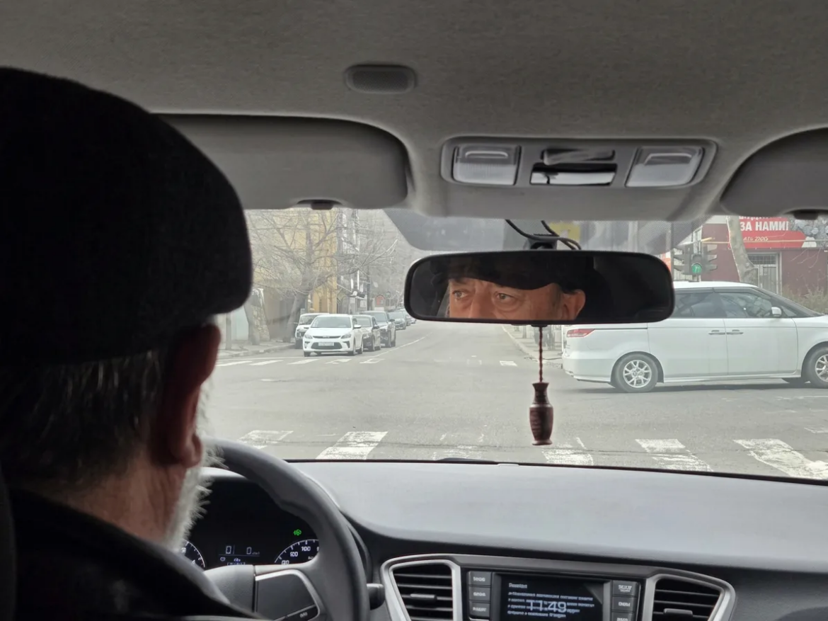 Таксист